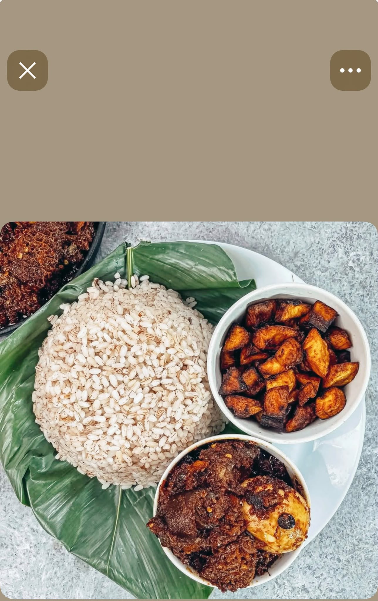 Ofada Rice & assorted meat sauce photo 3