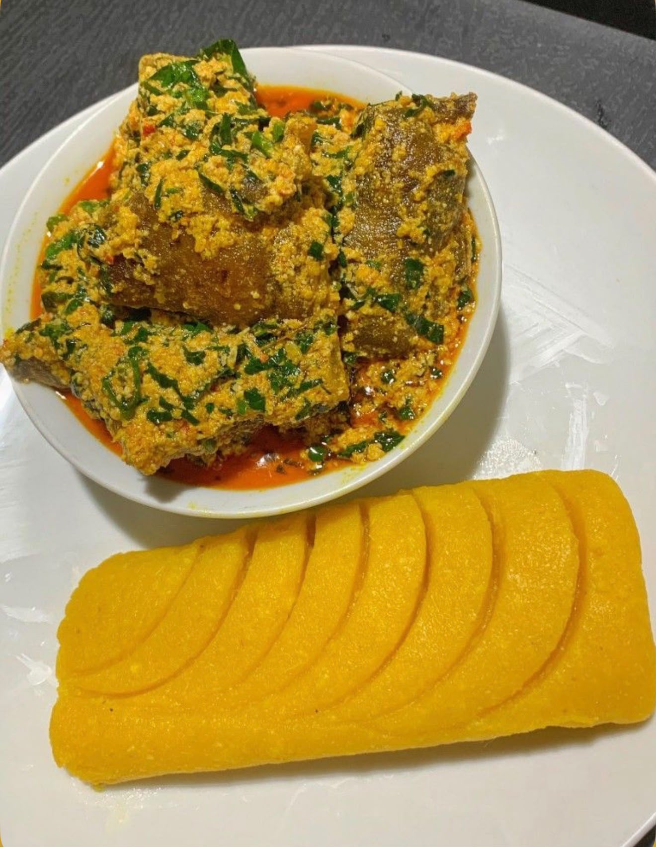 Egusi soup & yellow garri (Eba)