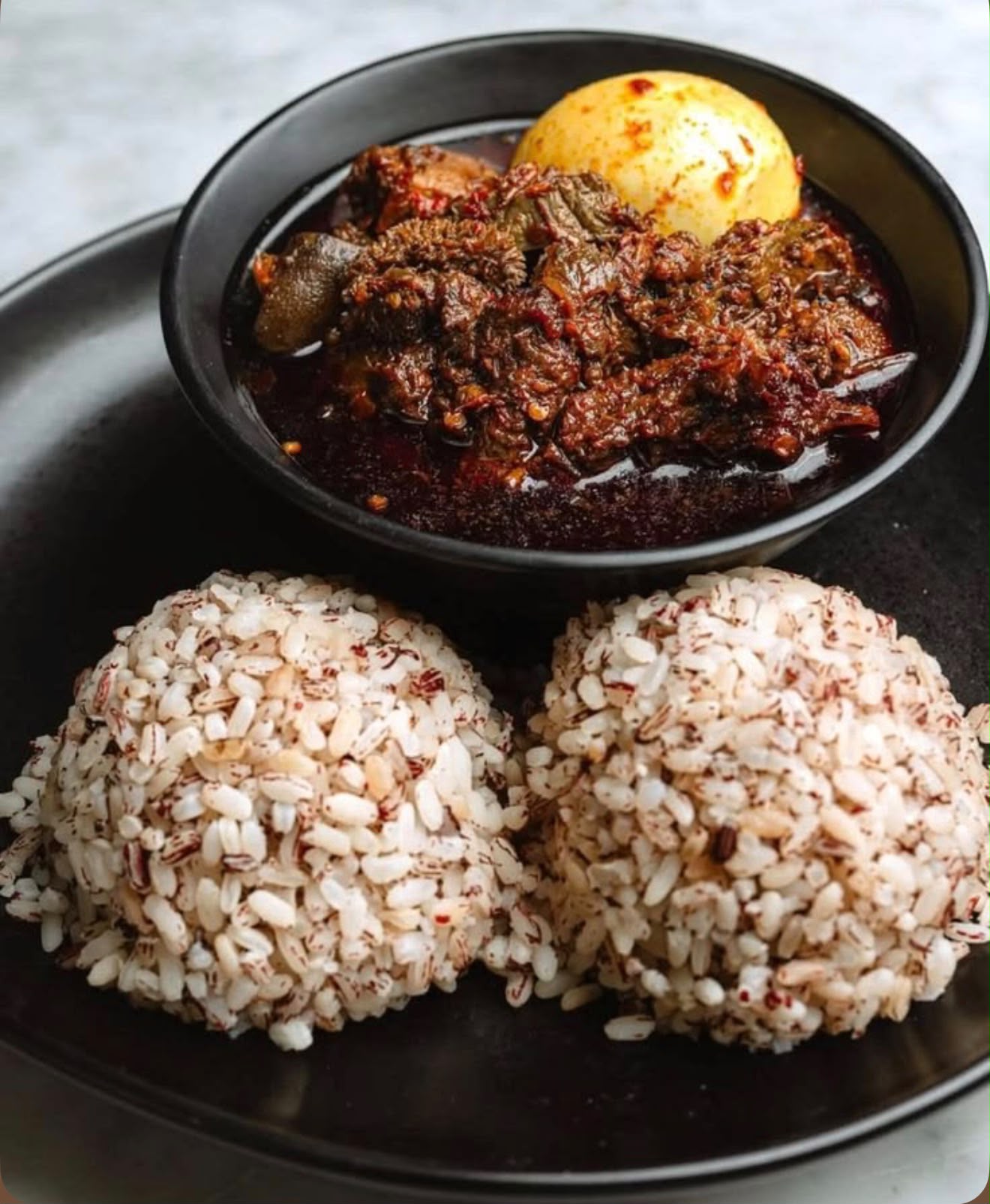 Ofada Rice & assorted meat sauce photo 4